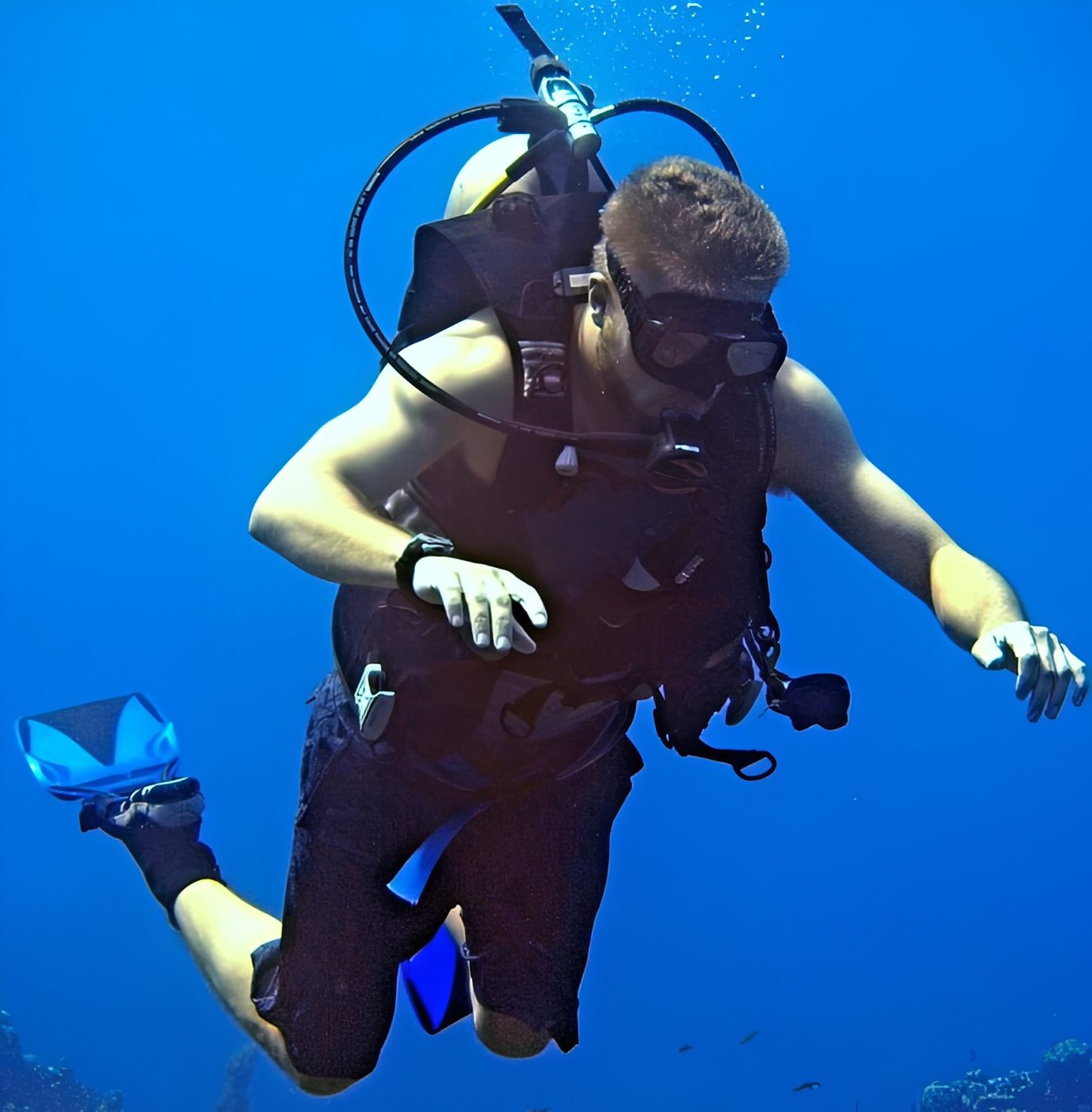 Diver in deep blue sea